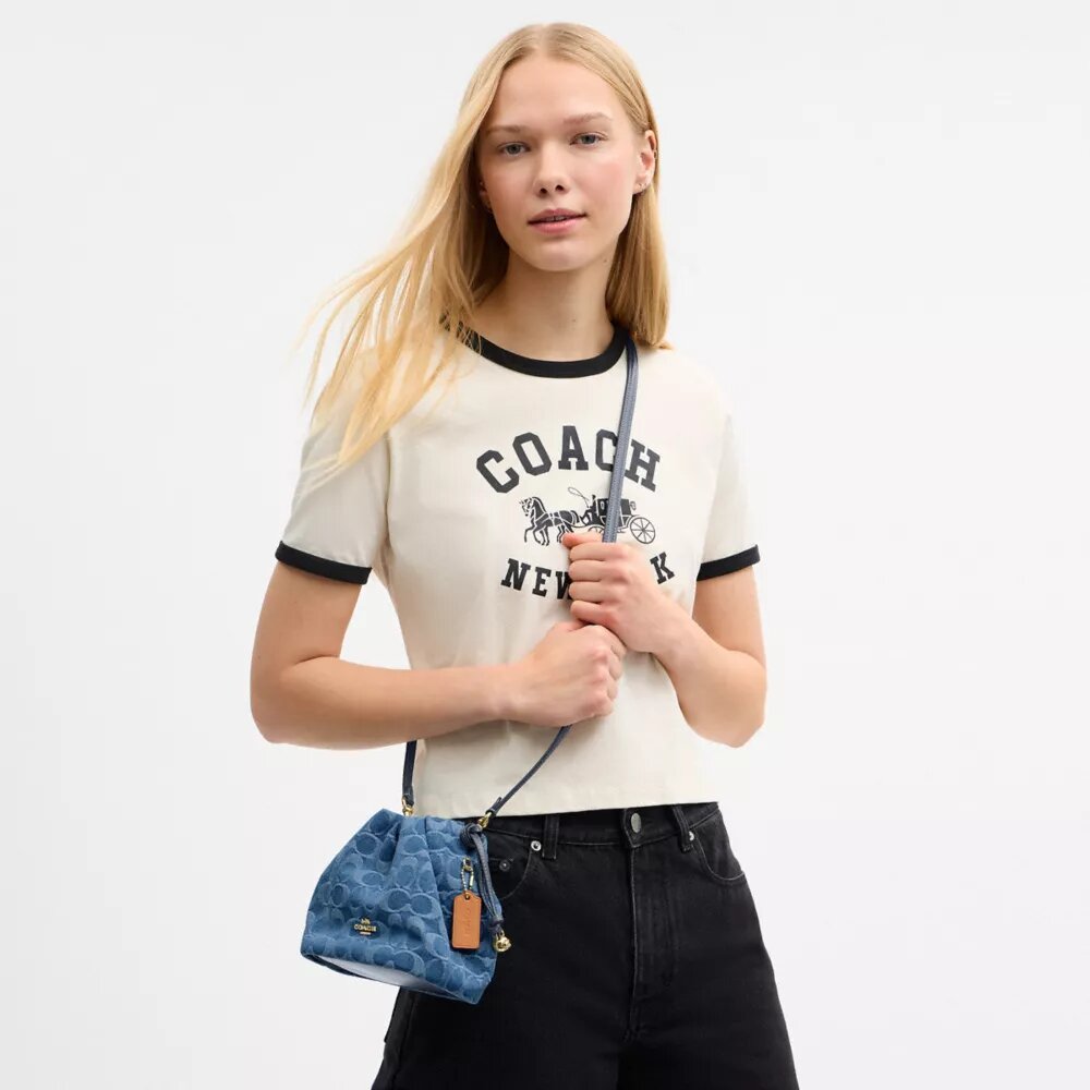 Borsa Faye Mini con coulisse in denim Signature