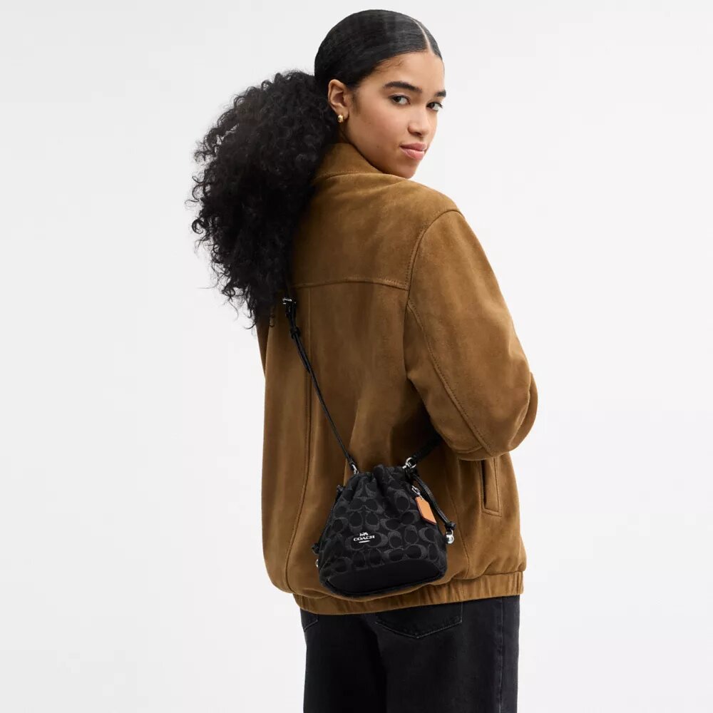Borsa Faye Mini con coulisse in denim Signature