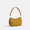 Borsa Swinger Disney X Coach in pelle rigenerativa con Topolino e i suoi amici