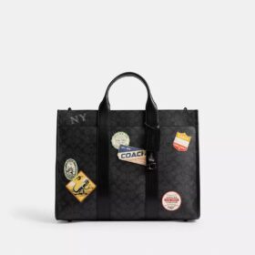 Borsa Wesley in Signature Canvas con toppe