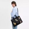 Borsa Wesley in Signature Canvas con toppe