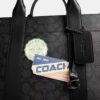 Borsa Wesley in Signature Canvas con toppe
