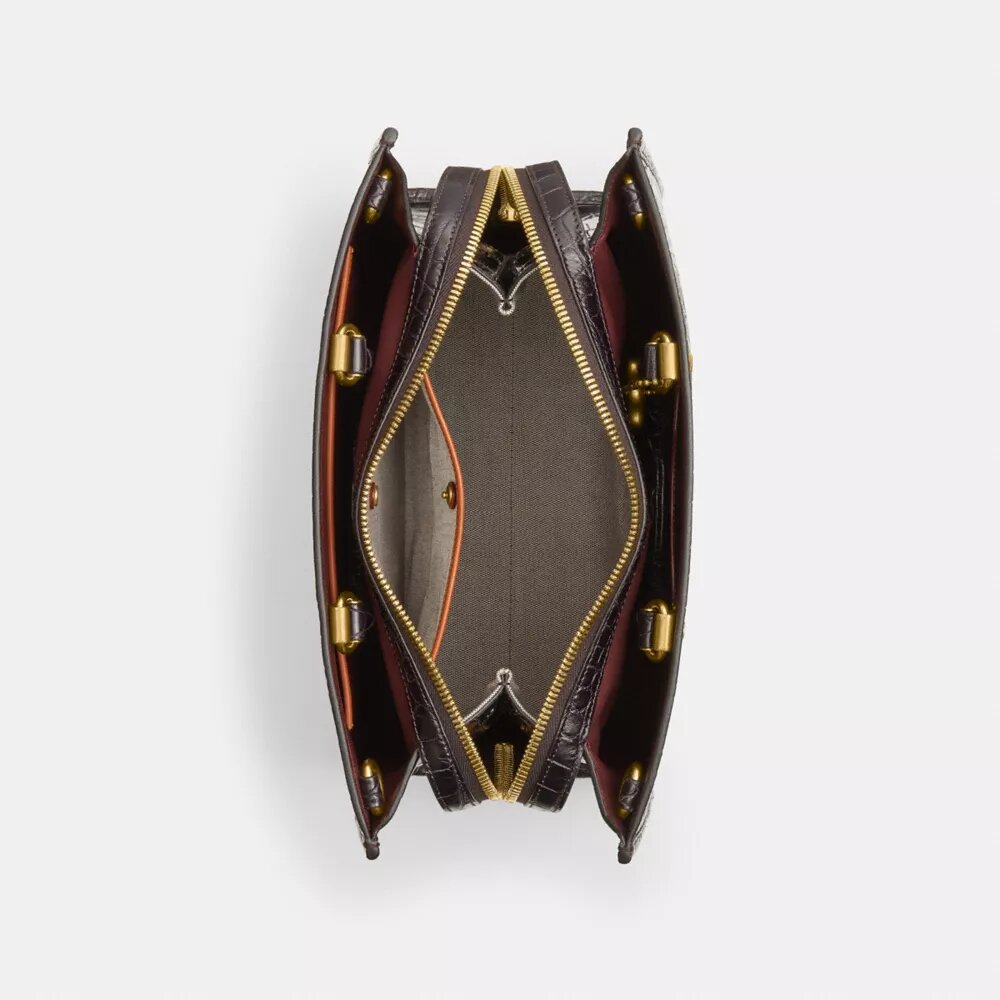 Borse Rogue in pelle di alligatore