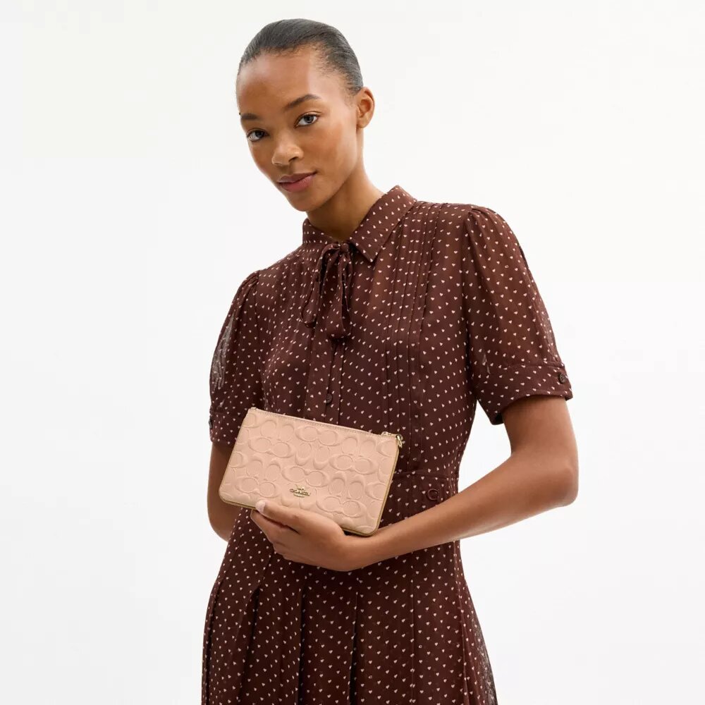 Borsello da polso Ashton in pelle Signature