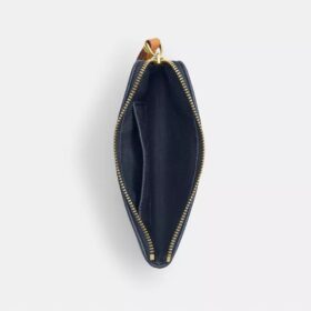 Borsello da polso con cerniera angolare in denim iconico