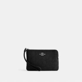 Borsello da polso con cerniera angolare in jacquard Signature