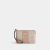 Borsello da polso con cerniera angolare in Signature Canvas a righe