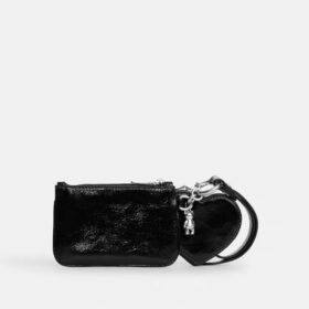 Borsello da polso e pochette a forma di cuore con ciondolo