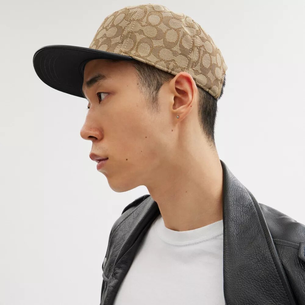 Cappello a tesa piatta in jacquard Signature