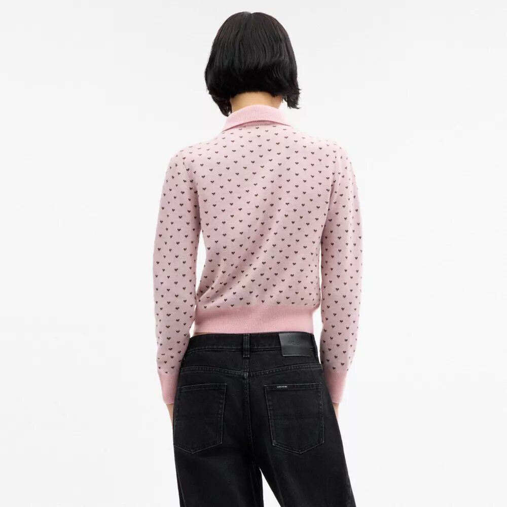 Cardigan con cuoricini rimpiccioliti