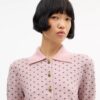 Cardigan con cuoricini rimpiccioliti
