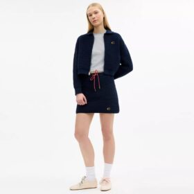Cardigan con zip frontale