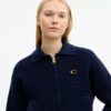Cardigan con zip frontale