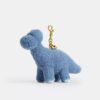 Ciondoli per borse "Buddy Dinosaur" in montone per il decimo compleanno di Rexy