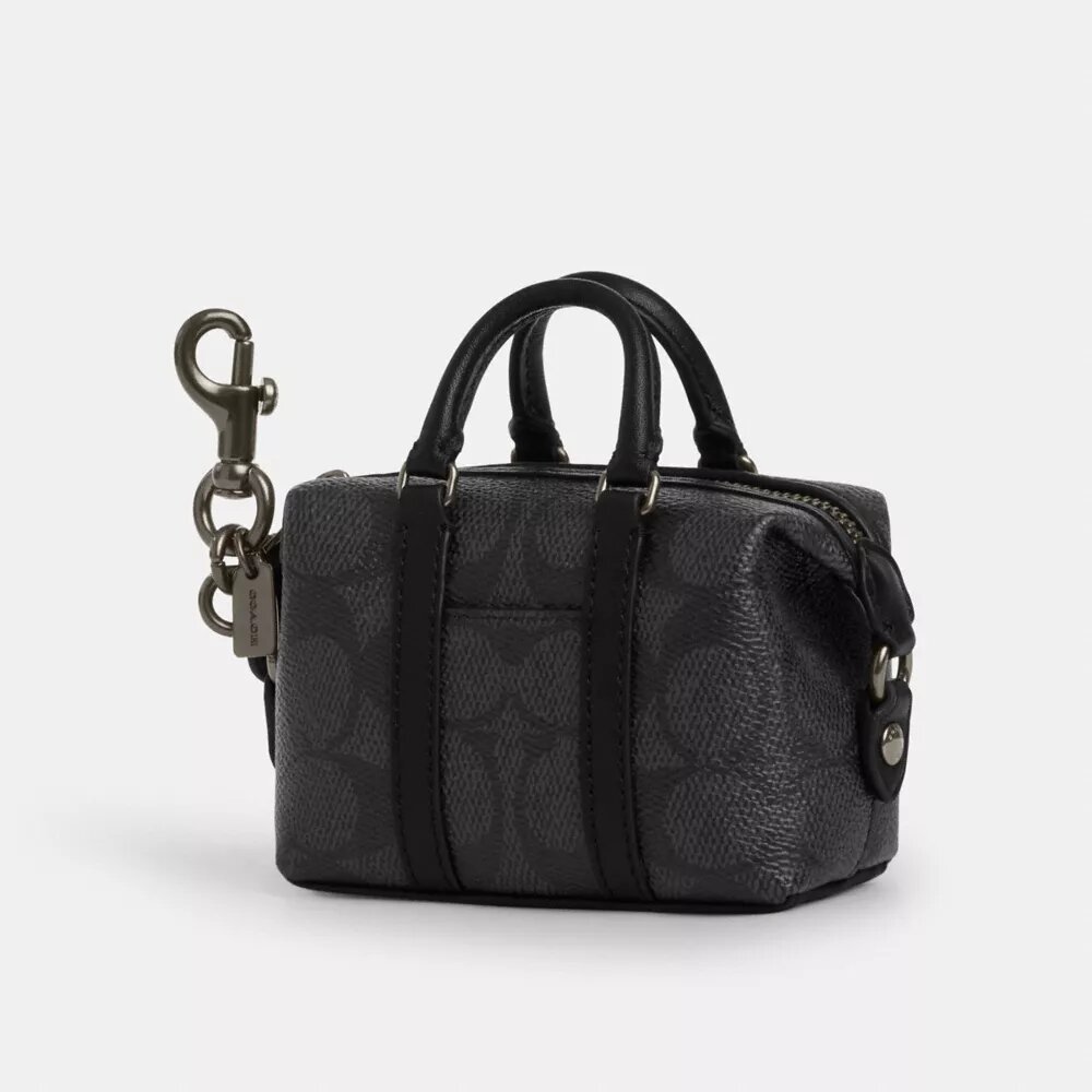 Ciondoli per borse Mini Trekker in Signature Canvas