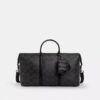 Ciondoli per borse Mini Trekker in Signature Canvas