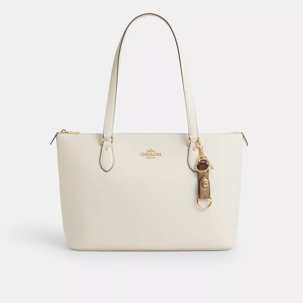 Ciondolo per borsa con chiusura a scatto in Signature Canvas