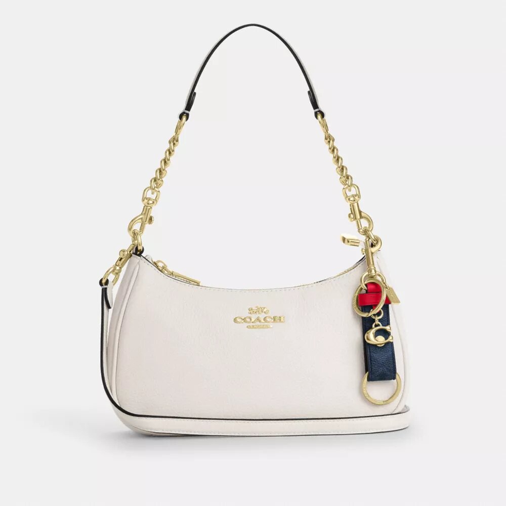 Ciondolo per borsa con chiusura a scatto in Signature Canvas con ciondolo