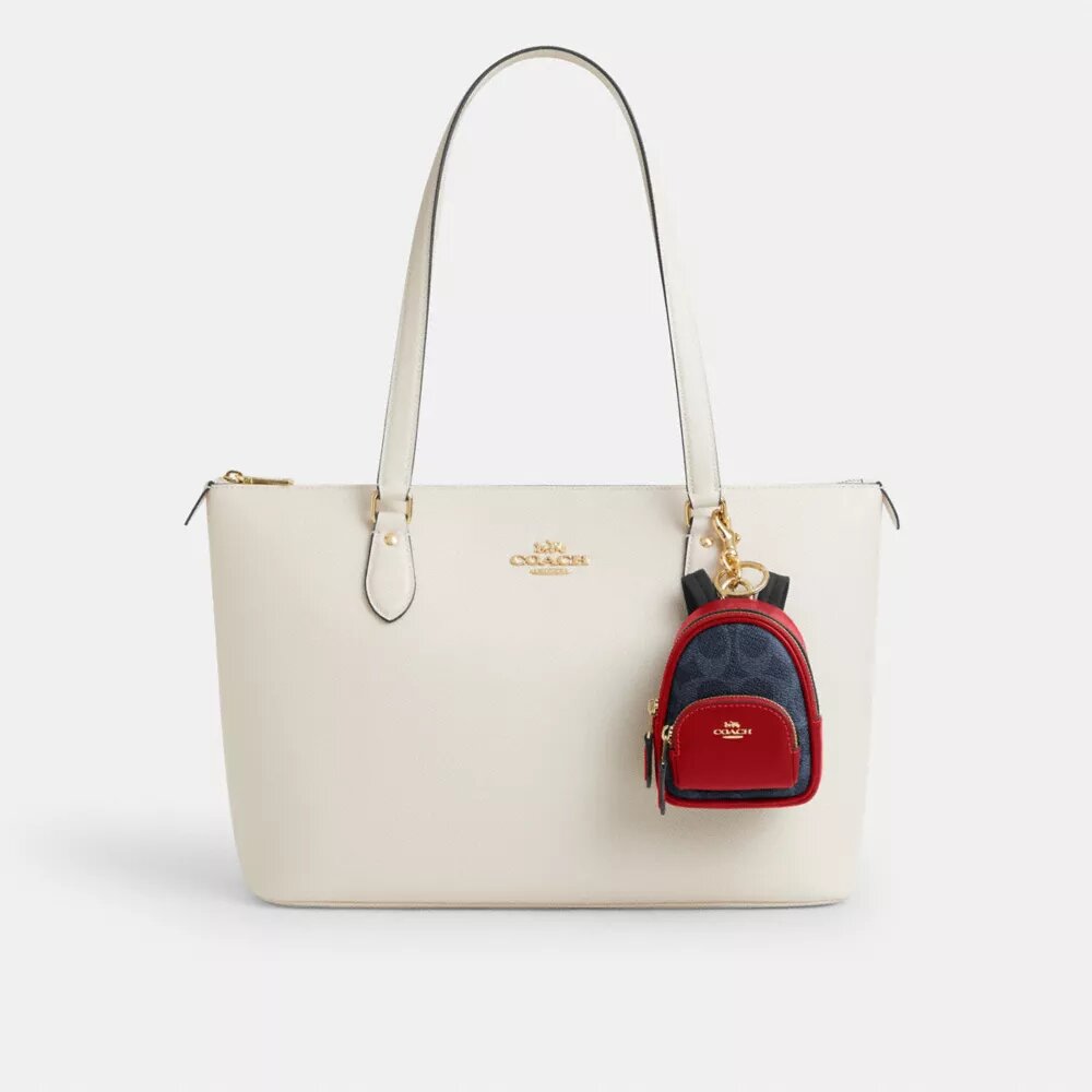Ciondolo per zaino Mini Court in Signature Canvas