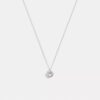 Collana con ciondolo a forma di cuore con montatura a corona