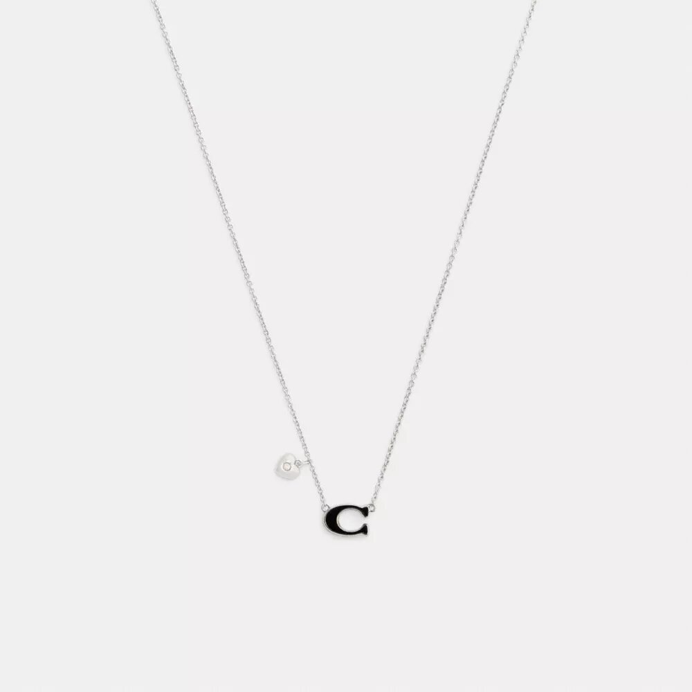 Collana con ciondolo a forma di cuore smaltato con firma