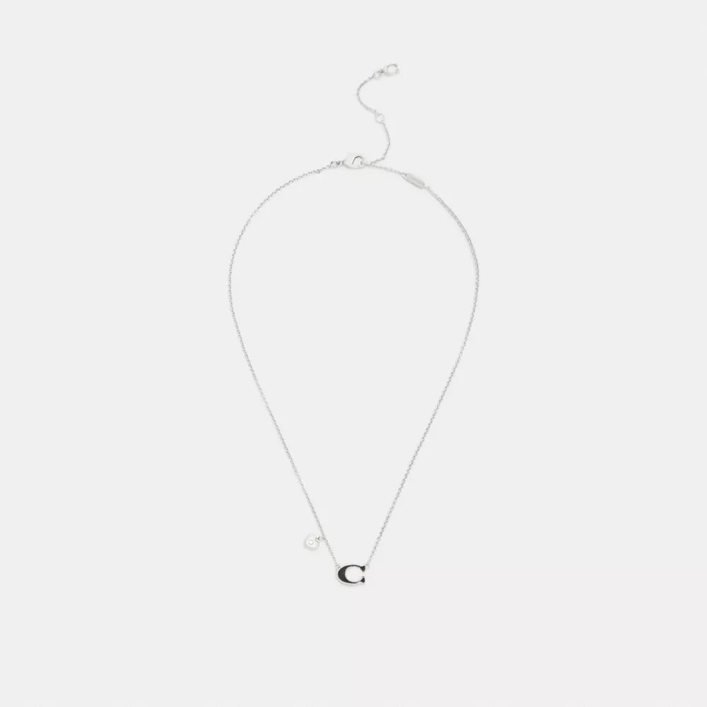 Collana con ciondolo a forma di cuore smaltato con firma
