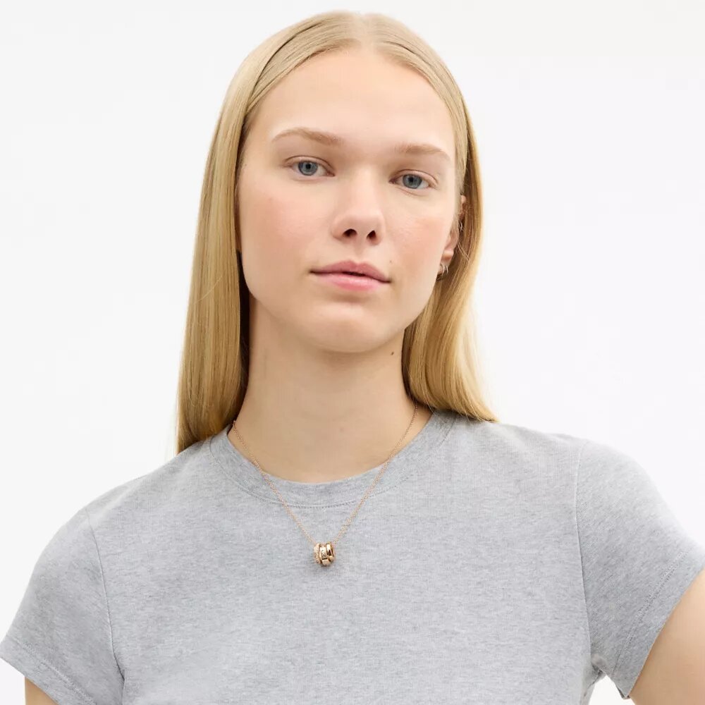 Collana con rondelle a C ripetute