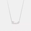 Collana con targhetta in stile Coach Script