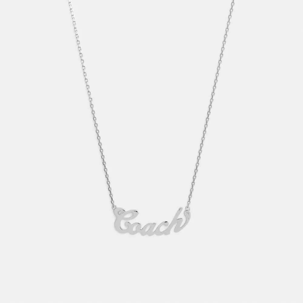 Collana con targhetta in stile Coach Script