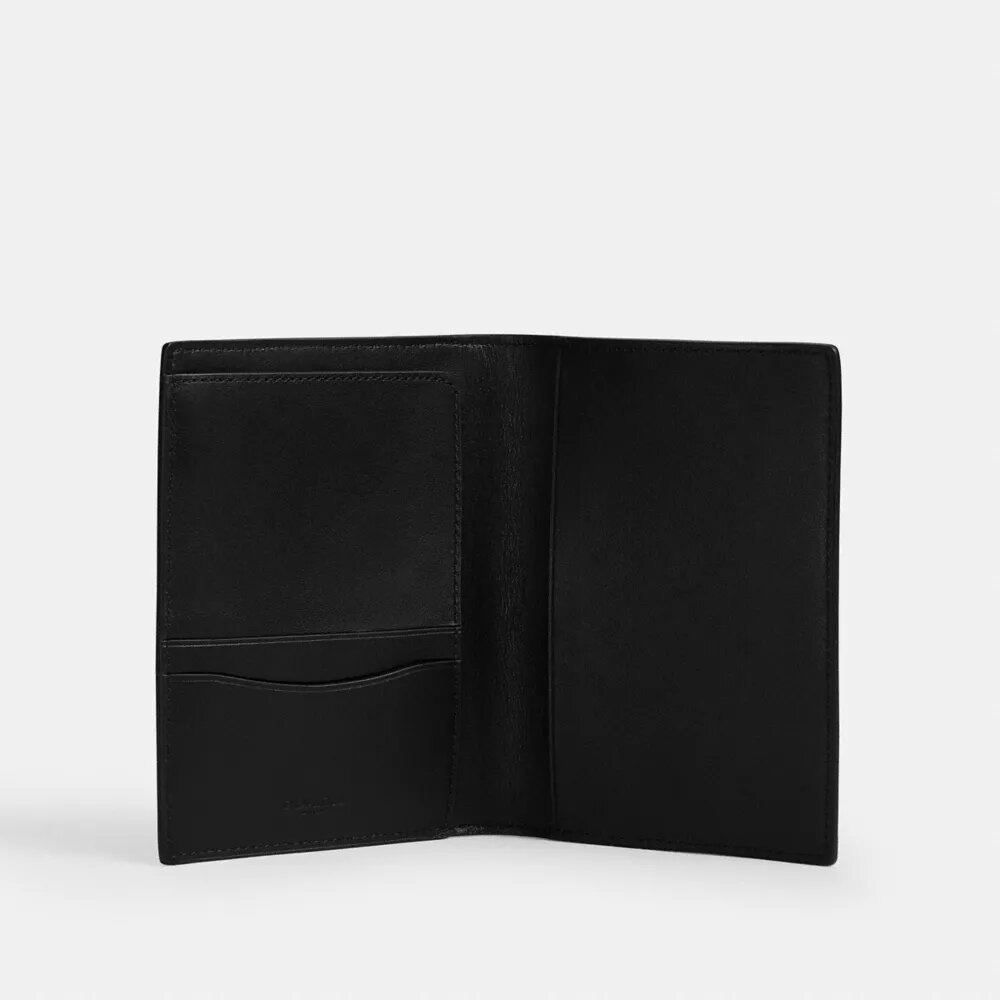 Custodia per passaporto in Signature Canvas con toppe