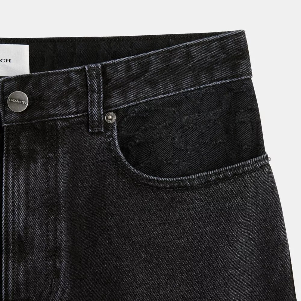 Jeans neri affusolati in cotone biologico