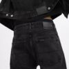 Jeans neri affusolati in cotone biologico