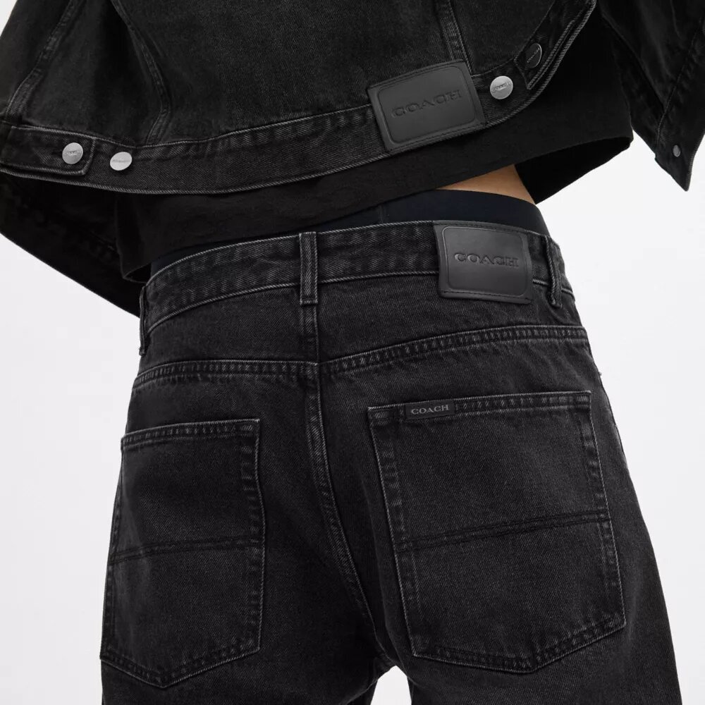 Jeans neri affusolati in cotone biologico