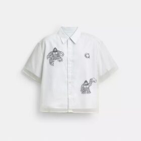 Maglie e Pantaloni Coach
