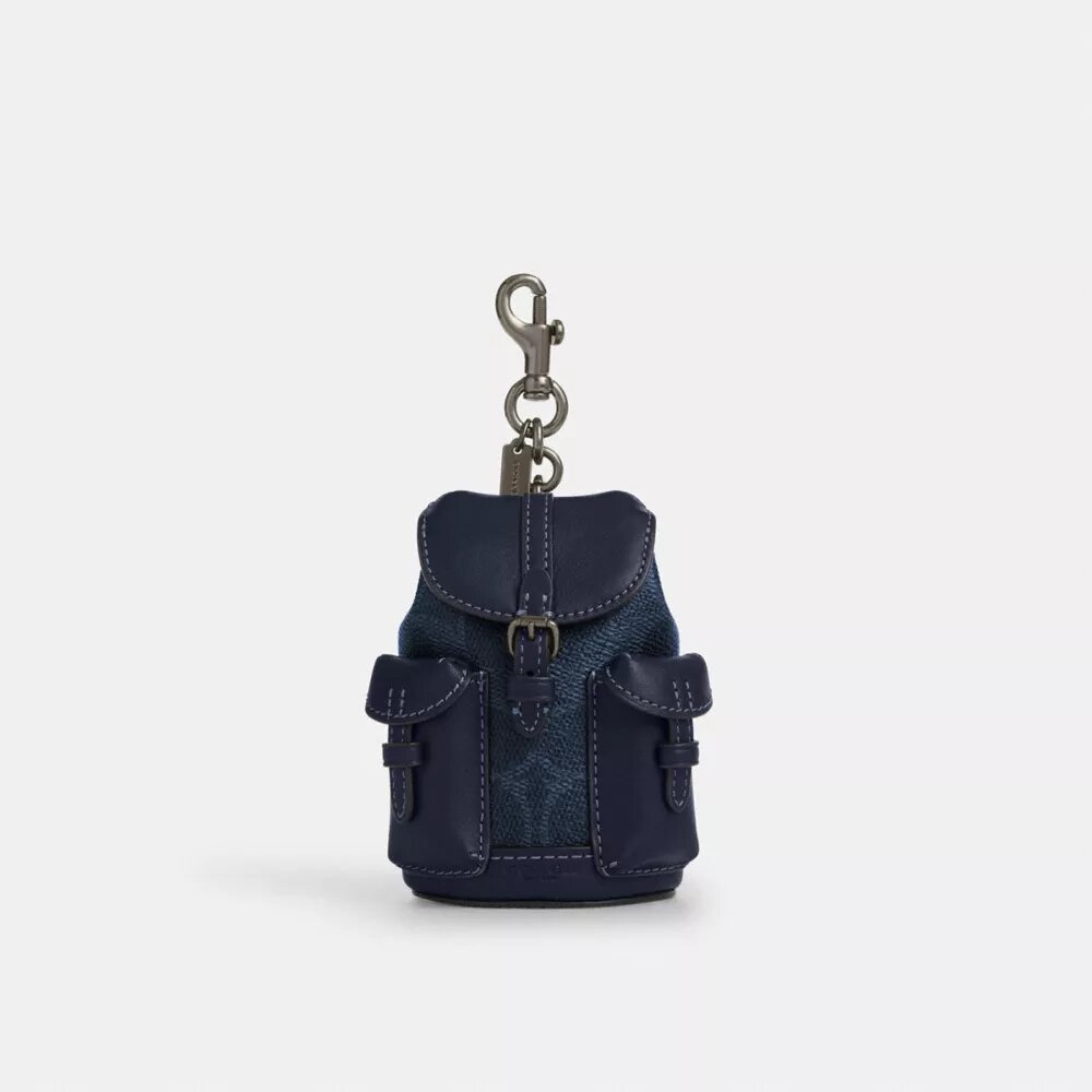 Mini ciondoli per zaini Warner in Signature Canvas