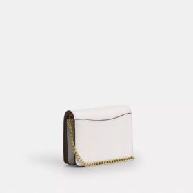 Mini portafoglio con catena e rivetti a forma di cuore