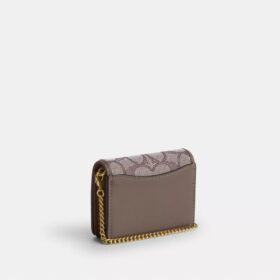 Mini portafoglio con catena in jacquard esclusivo con ricamo floreale