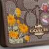 Mini portafoglio con catena in jacquard esclusivo con ricamo floreale