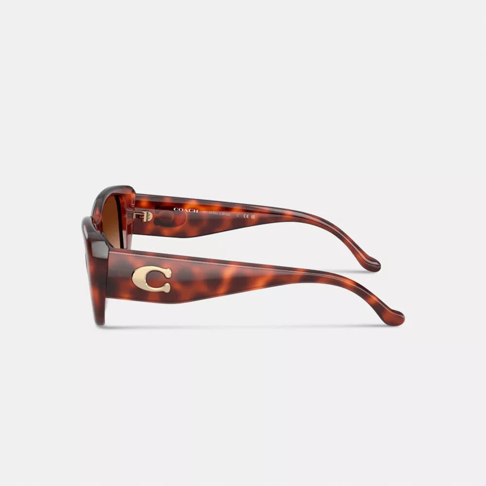 Occhiali da sole rettangolari oversize con "C" scolpita