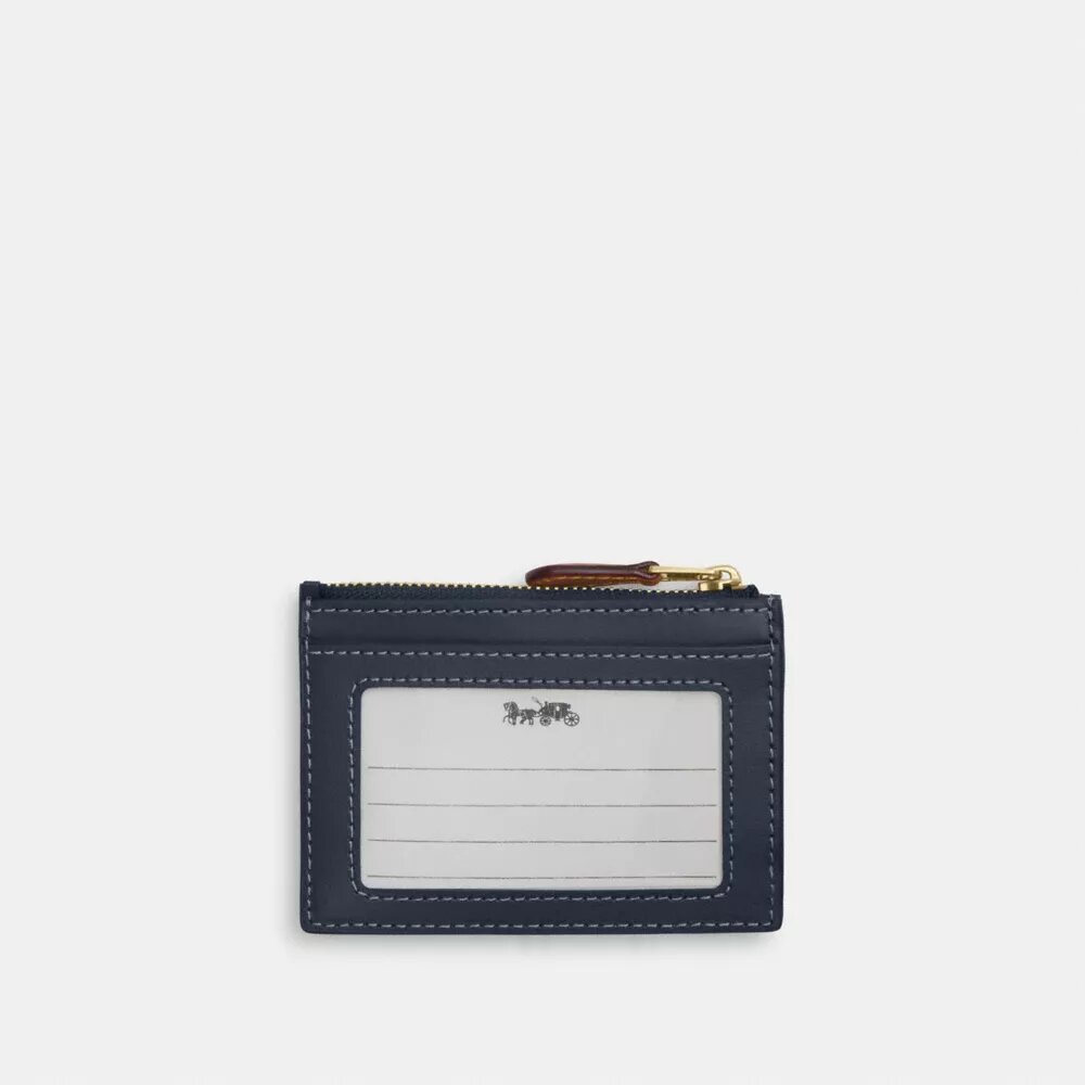 Porta documenti Mini Skinny in denim esclusivo