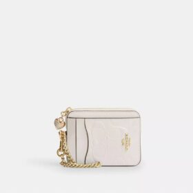 Portacarte con cerniera in pelle iconica con ciondolo a forma di cuore