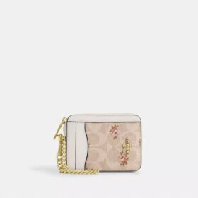Portacarte con cerniera in Signature Canvas con stampa floreale