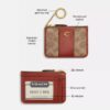Portacarte d'identità Essential Mini in Signature Canvas