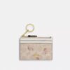 Portadocumenti Mini Skinny in Signature Canvas con stampa floreale