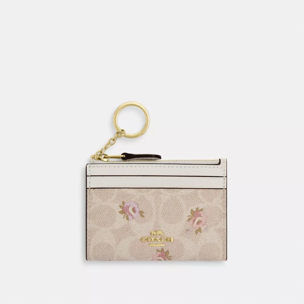 Portadocumenti Mini Skinny in Signature Canvas con stampa floreale