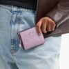 Portafoglio con bottoni a pressione in pelle Signature con ciondolo a forma di cuore