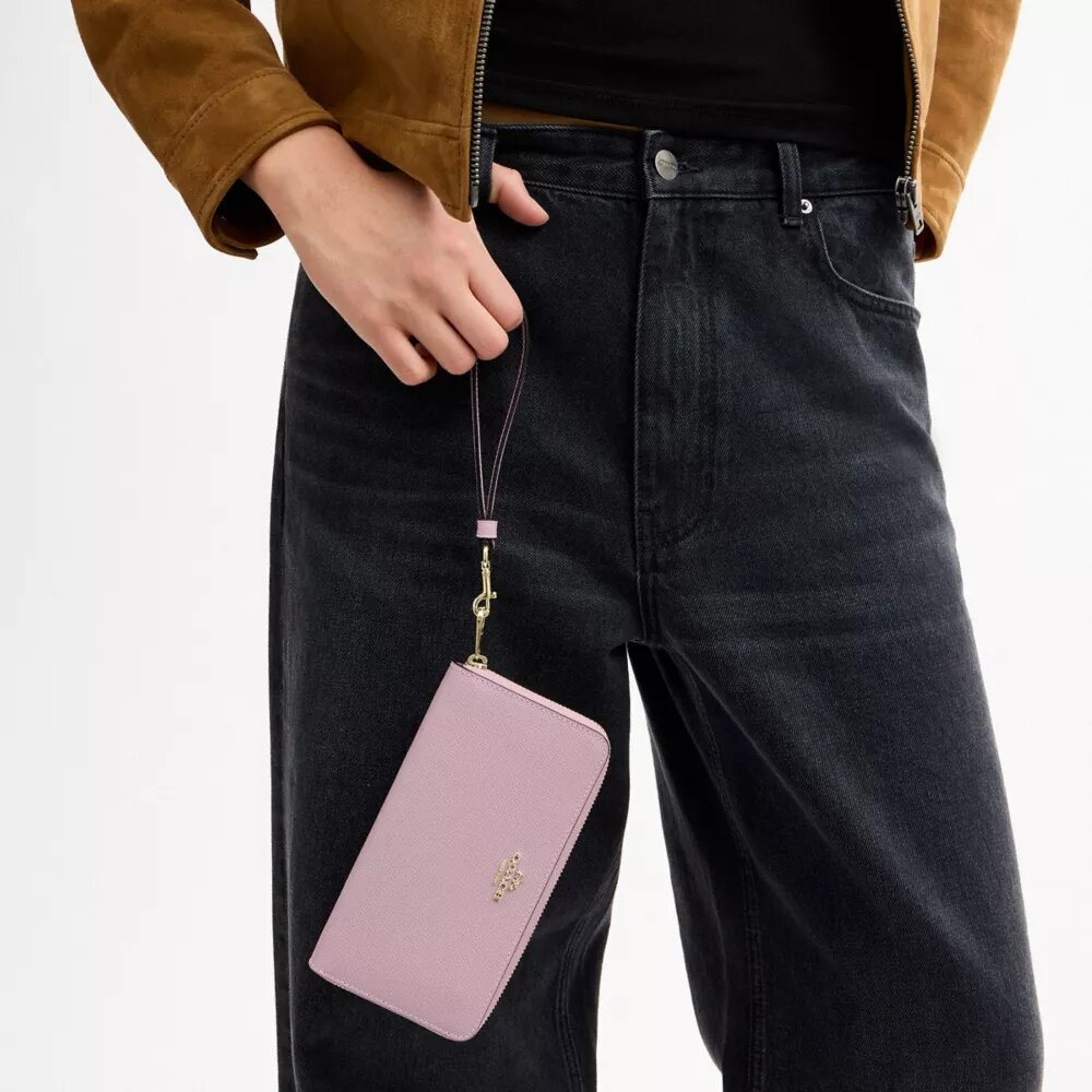 Portafoglio lungo con chiusura a zip perimetrale