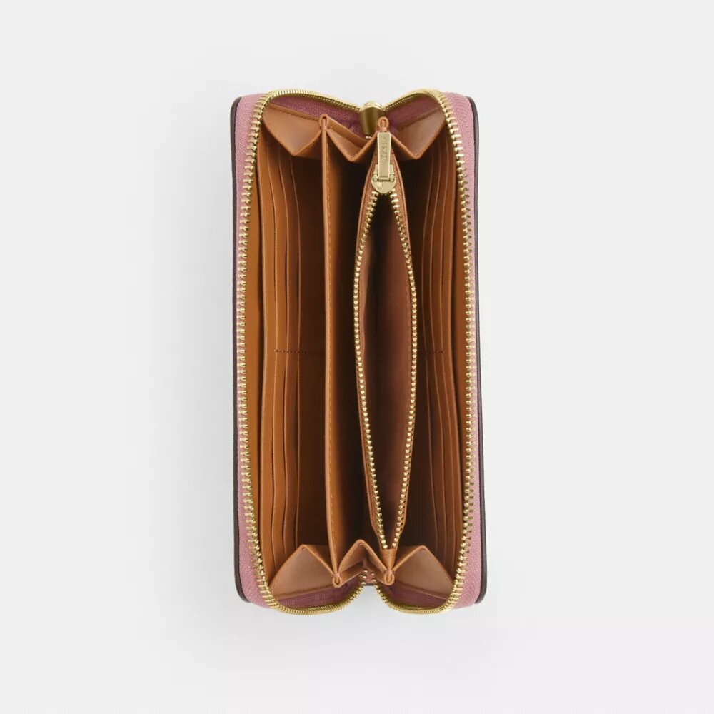 Portafoglio lungo con chiusura a zip perimetrale e stampa floreale