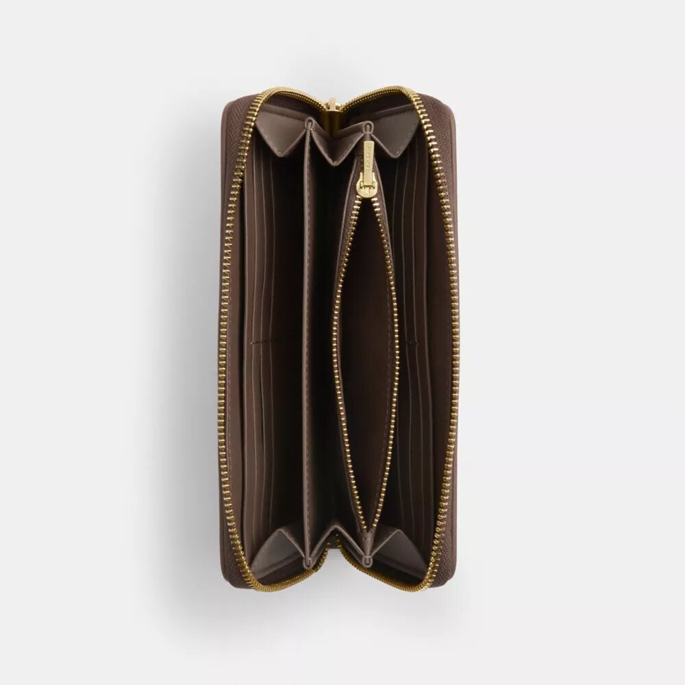 Portafoglio lungo con chiusura a zip perimetrale in jacquard Signature con ricami floreali
