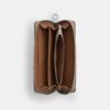 Portafoglio lungo con chiusura a zip perimetrale in Signature Canvas a righe